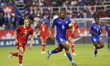 Melchie Dumornay #6 of Haiti and Jessie Fleming #17 of Canada battle for possession during...