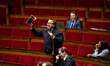 Francois Cormier-Bouligeon, deputy of the Ensemble pour la Republique group, raises the Na...