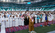 A Qatari imam, Ahmed Al-Dosari, gives a sermon in front of worshipers after the Eid al-Adh...