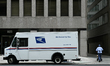 WASHINGTON, DC - MAY 27: A United States Postal Service (USPS) logo is seen on a delivery...