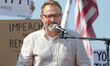 Comedian and activist Cliff Cash speaks at a protest organized by We Are the Flood and May...