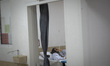 An elderly Iranian woman rests in her bed at Kahrizak charity nursing home in southern Teh...