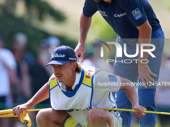 CALEDON, ONTARIO - JUNE 07: Cameron Young of Palm Beach Gardens, Florida looks over the 16th green with his caddie during the third round of... by Amy Lemus/NurPhoto