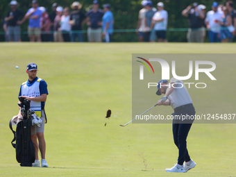 CALEDON, ONTARIO - JUNE 07: Cristobel Del Solar of Jupiter, Florida hits from the 15th fairway next to his caddie  during the third round of... by Amy Lemus/NurPhoto