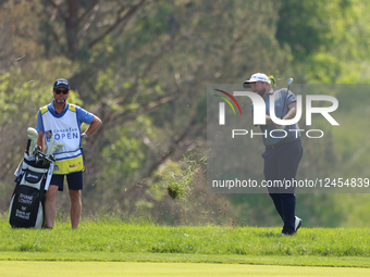 CALEDON, ONTARIO - JUNE 07: Shane Lowry of Ireland hits from the 15th fairway next to his caddie  during the third round of the RBC Canadian... by Amy Lemus/NurPhoto