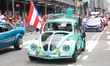 Classic cars drive up the avenue during the 68th Annual Puerto Rican Day Parade on 5th Ave...