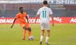 Lazare Amani #15 of Cote D'Ivoire runs with the ball during the International Friendly mat...
