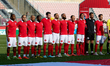 Malta national team players stand during the playing of their country's national anthem be...