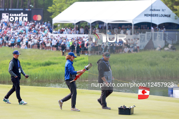 CALEDON, ONTARIO - JUNE 08: The grounds team completes the moving of the hole during a series of playoffs between Ryan Fox of New Zealand an... by Amy Lemus/NurPhoto