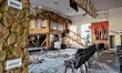 Glass shards cover the floor after a Russian drone attack in Odesa, Ukraine, on June 10, 2...