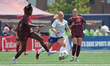 Esther Okoronkwo #23 of AFC Toronto is pressured by Emma Regan #8 of Ottawa Rapid FC durin...