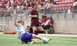 Jyllissa Harris #33 of Ottawa Rapid FC slides for the ball against Aoi Kisaki #13 of AFC T...