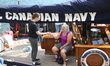 Visitors take photos aboard the HMCS Oriole in Toronto, Ontario, Canada, on September 16,...