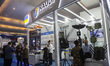 Visitors are at the Ukrainian pavilion during the Indo Defence 2025 Exhibition in Jakarta,...