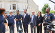 Actor Noah Wyle, center, walks through Capitol Hill with his mother, retired nurse Marjori...