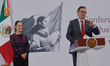Mexico's President Claudia Sheinbaum Pardo stands behind while Mexico's Economic Minister,...