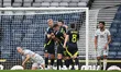John Souttar of Scotland celebrates after scoring his side's first goal during an Internat...