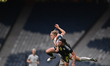Andri Gudjohnsen of Iceland and John Souttar of Scotland vie for the ball during an Intern...