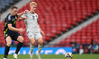 Hakon Arnar Haraldsson of Iceland and Lewis Ferguson of Scotland are in action during an I...