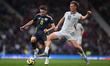 Albert Gudmundsson of Iceland and Billy Gilmour of Scotland play during an International F...