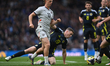 Albert Gudmundsson of Iceland and Lewis Ferguson of Scotland play during an International...