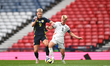 Hakon Arnar Haraldsson of Iceland and George Hirst of Scotland vie for the ball during an...