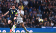 Victor Palsson of Iceland and Andy Robertson of Scotland vie for the ball during an Intern...