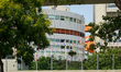 The exterior view of the United Nations Office at Vienna (UNO City) shows international fl...