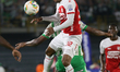 Christian Mafla, a player for Independiente Santa Fe, heads the ball during the match betw...