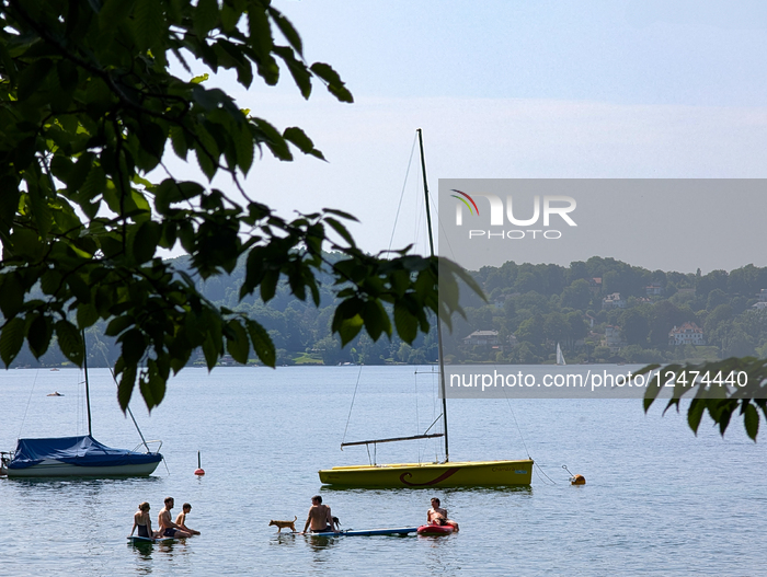 People At The Bavarian Lake Starnberg On A Hot Summer Day