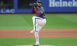 New York Mets starting pitcher Tylor Megill (38) throws during the fourth inning of a base...