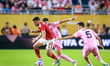 Mahmoud Ahmed Ibrahim ''TREZEGUET'' of Al Ahly battles for possession with Sergio BUSQUETS...