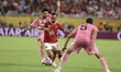 Mohamed Magdy Afsha of Al Ahly FC and Lionel Messi of Inter Miami participate in the FIFA...
