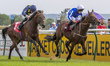 HOT DANCER, ridden by Jason Hart and trained by C Johnston, races to the front during the...