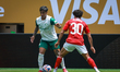 Facundo Torres of Palmeiras battles for possession with Mohamed Hany of Al Ahly during the...