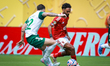 Emiliano Martinez of Palmeiras battles for possession with Hussein Elshahat of Al Ahly dur...