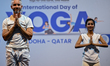 People participate in a yoga session on the 11th International Day of Yoga organized by th...