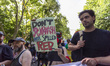 A person holds a banner during the EuroPride LGBTQ+ parade in Lisbon, Portugal, on June 21...