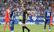 Gorka Etayo Herrera shows a yellow card to Borja Valle of SD Ponferradina during the Spani...