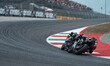 Francesco Bagnaia of the Ducati Lenovo Team and Marc Marquez of the Ducati Lenovo Team par...