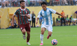 Matheus Martinelli #8 of Fluminense FC and Jinhyun Lee #14 of Ulsan HD FC battle for the b...