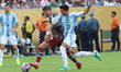 Everaldo Stum #9 of Fluminense FC and Jung Wooyoung #5 of Ulsan HD FC battle for the ball...