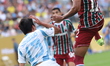 Gabriel Fuentes #12 of Fluminense FC and Kang Sang-woo #13 of Ulsan HD FC battle for the b...