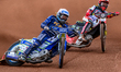 Chris Harris of King's Lynn Stars in white leads Jaimon Lidsey of Belle Vue Aces in red du...