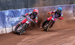 Dan Bewley of Belle Vue Aces in red leads teammate Norick Blodorn in blue during the Rowe...