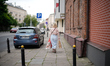 A woman walks with shoppin bags in Warsaw, Poland on 24 June, 2025. 