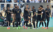 Honduras teammates celebrate after scoring a goal during the Concacaf Gold Cup Group B mat...