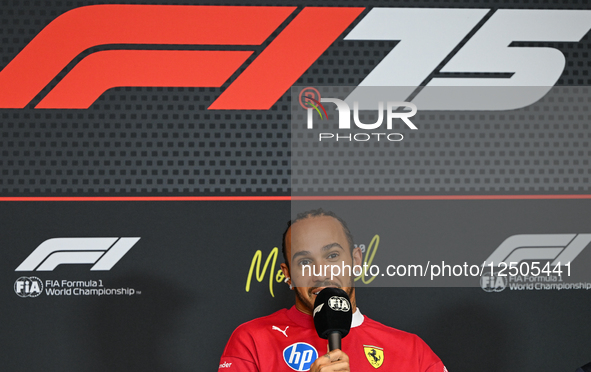 MONTREAL, CANADA - JUNE 12: Lewis Hamilton of Great Britain and Scuderia Ferrari during the press conference on preview day for the Formula...