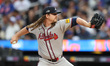 Atlanta Braves starting pitcher Grant Holmes (66) throws during the second inning of the b...