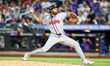 Atlanta Braves relief pitcher Michael Petersen (70) throws during the eighth inning of the...